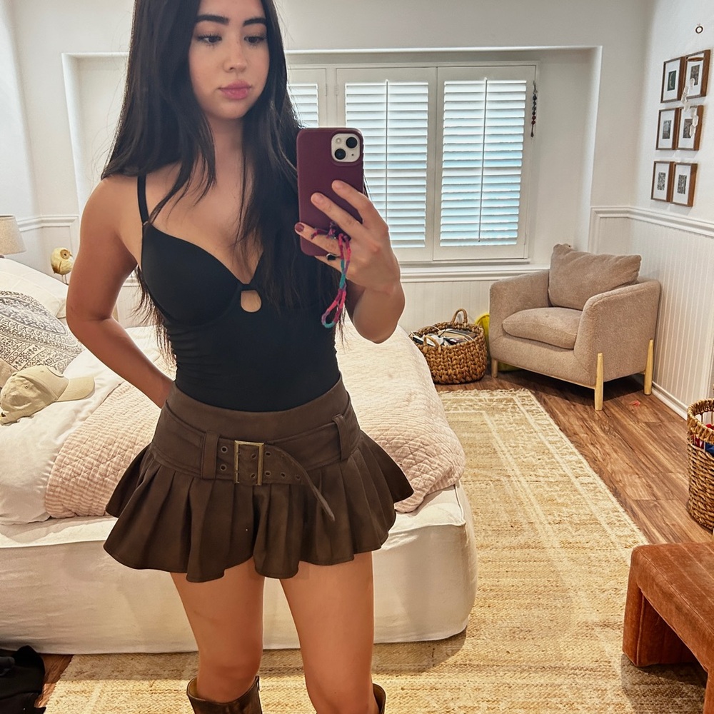 Two pleated skirts